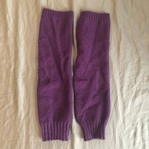 Purple leg warmers. Normal wear and tear